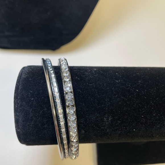 Three Elegant Silver Tone and Crystal Bangle Stacking Bracelets - Picture 2 of 6